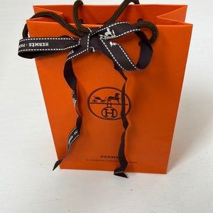 Hermes paper bag with ribbon